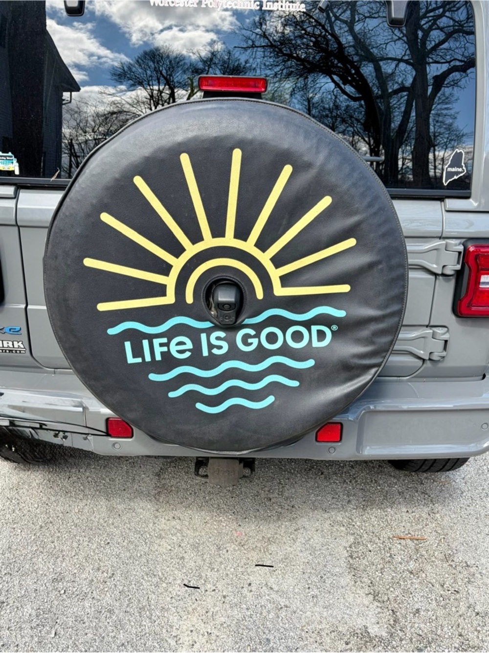 Life Is Good Jeep Tire Cover with Yellow Sun and Teal Waves
